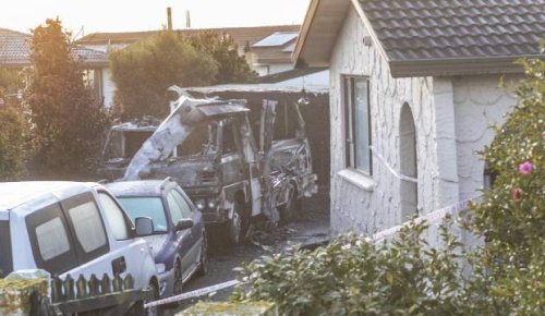 Fears father may have died in campervan fire while son slept next door