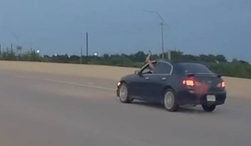 Watch an axe-wielding road-rager rear end a car into a ditch