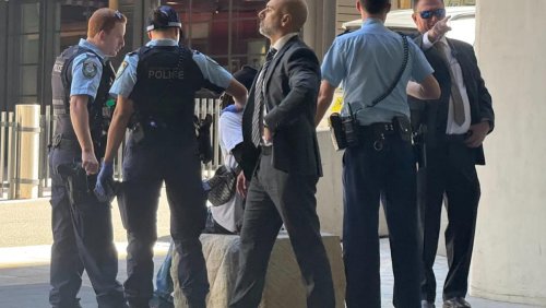 Australian prime minister’s security detail caught up as man arrested outside Channel Nine HQ