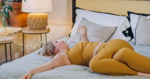 8 core, glute and quad-strengthening exercises you can do in bed while watching Netflix, according to PTs