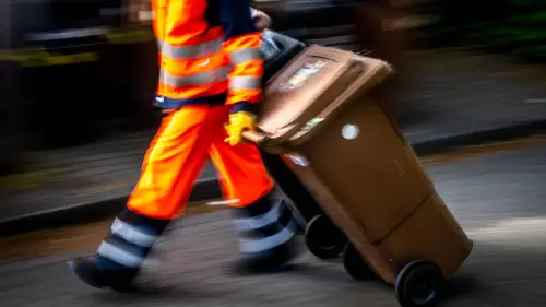 Müll aus einer Hand