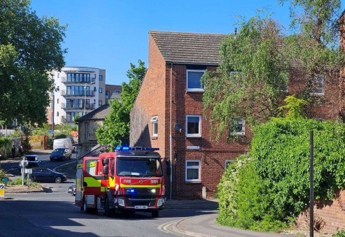 Emergency services called to flat fire in town