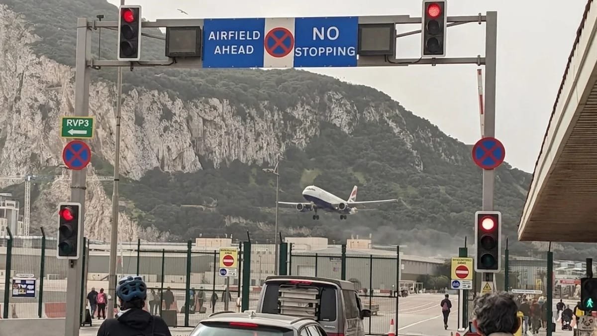 Most surreal airport in the world has cars stopping to allow planes to take off from a runway they drive over