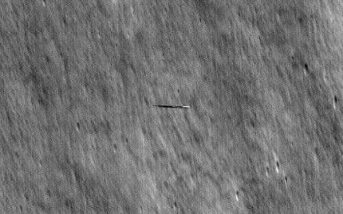 NASA reveals images of 'surfboard shaped object' orbiting the moon