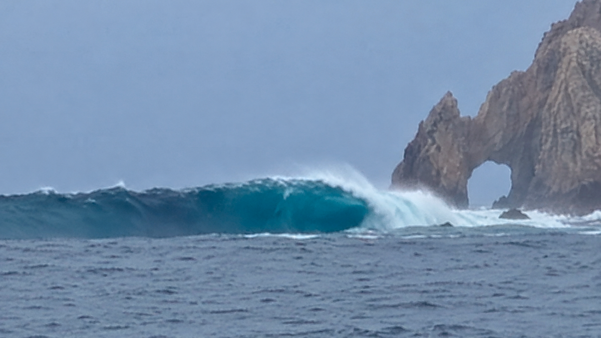 Watch: Hurricane Polo Sends Gigantic Waves to Cabo San Lucas Arch
