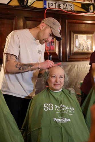 Hundreds attend St. Baldrick’s event and shave their heads for childhood cancer