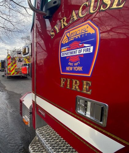 Syracuse firefighter burned while battling vacant house fire taken to Upstate University Hospital