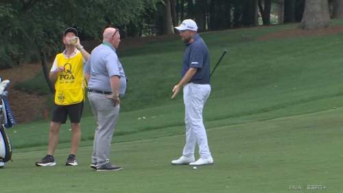 Furious Shane Lowry takes huge chunk out of fairway and flips off ball after arguing with PGA official