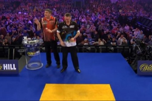 ‘Come on now’ – Darts cult hero has fans and commentators in stitches after flicking away intruder