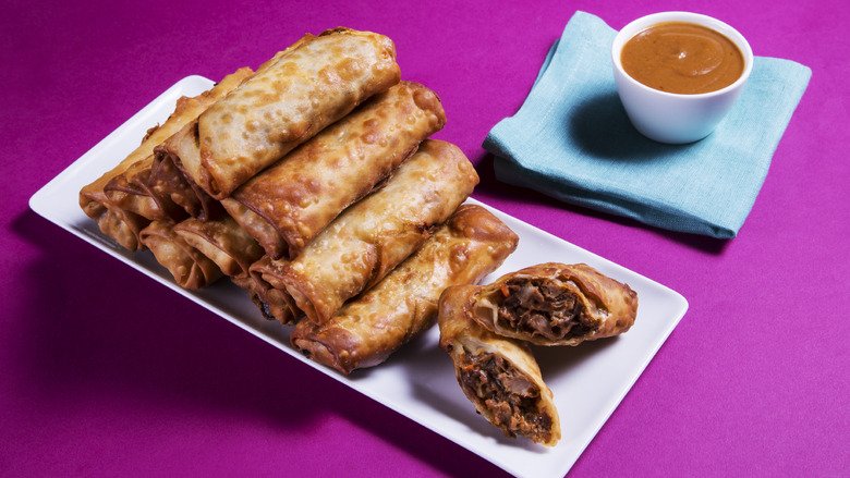 It's Unreal How Good Adam Richman's Pulled Pork Egg Rolls Are