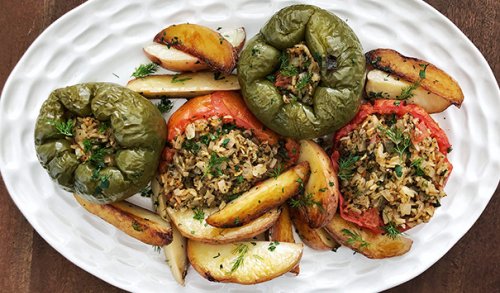 Learn how to make gemista, a traditional Greek dish of peppers and tomatoes stuffed with rice, with this recipe from Meraki Greek Bistro in Miami, Florida.