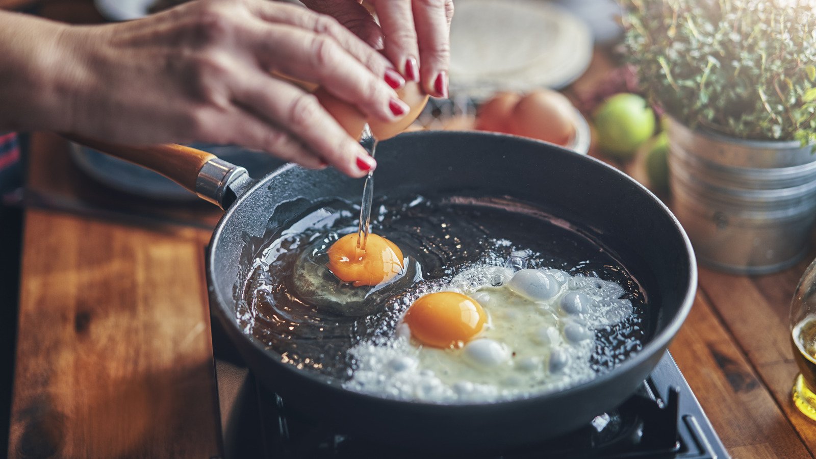 The Easy Way To Add Umami Flavor To Fried Eggs While They Cook