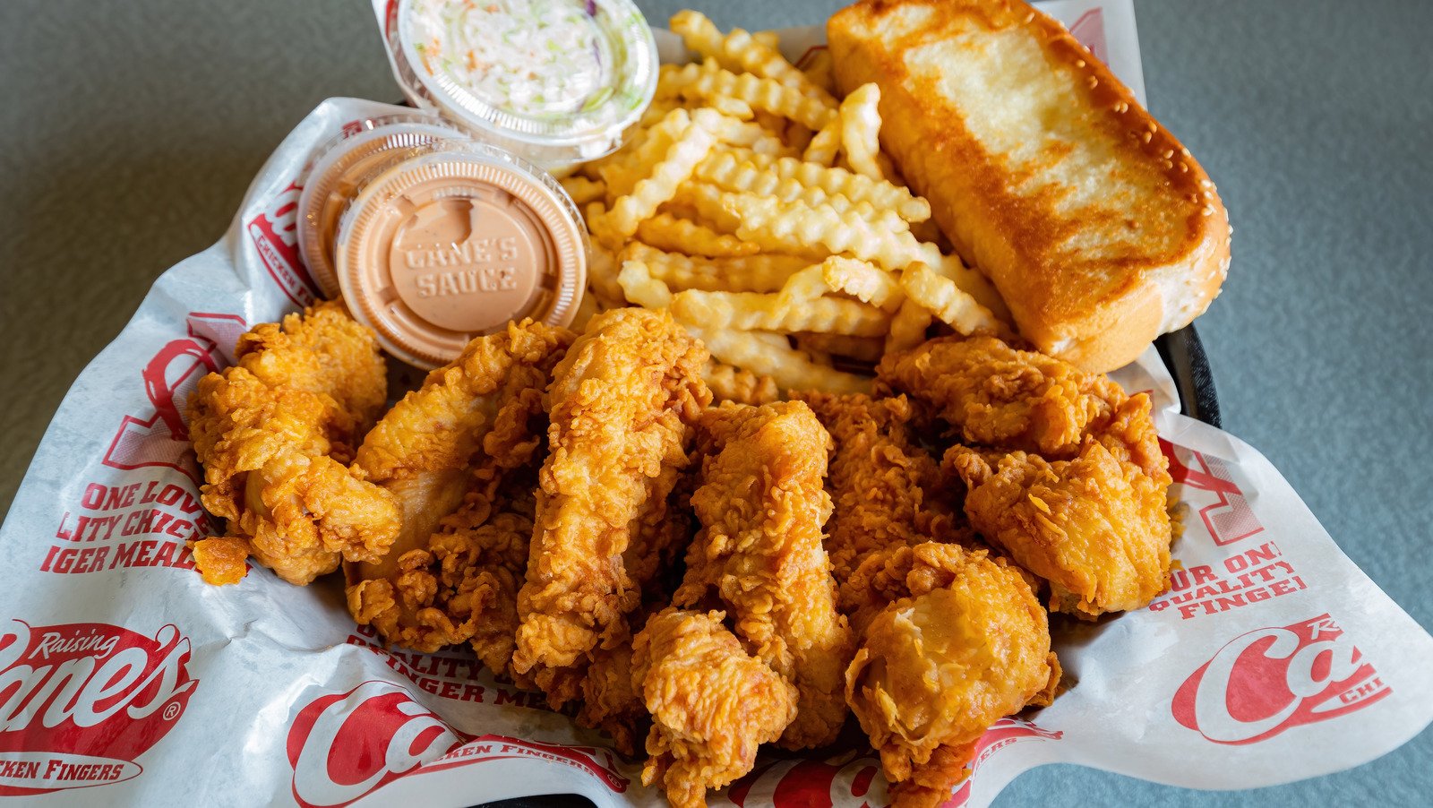 The Savory Secret That Makes Raising Cane's Chicken Sauce Taste So Good