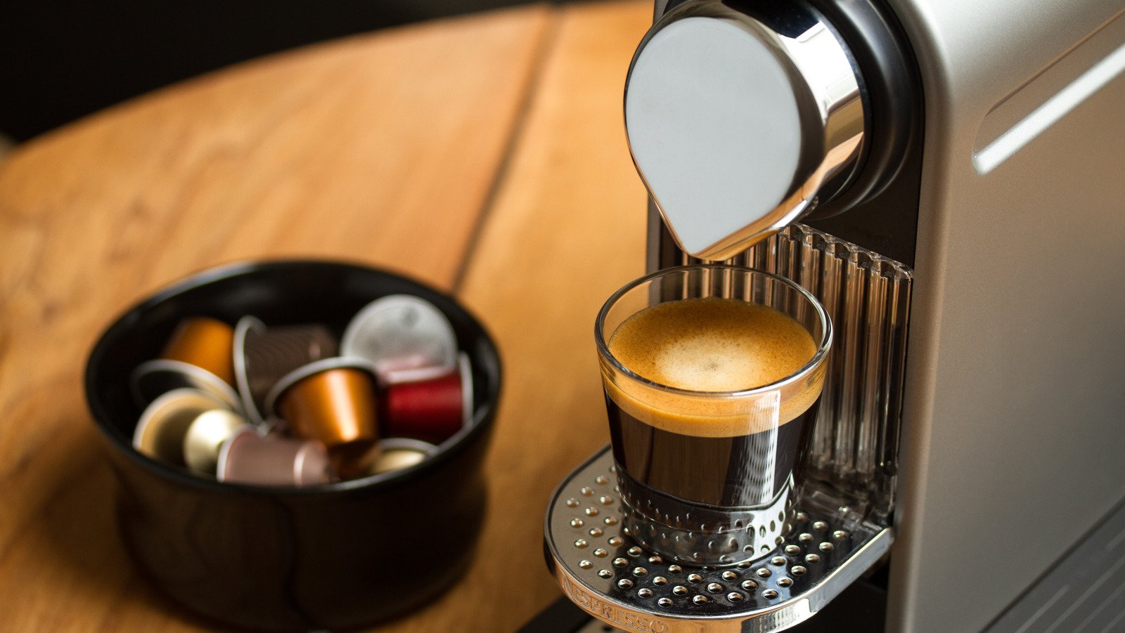 The Messy Mistake You're Making When Emptying Your Nespresso Machine
