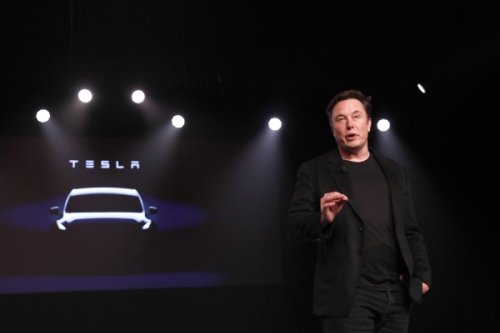 Tesla won't set up manufacturing plant in India until allowed to first sell and service cars, Elon Musk says