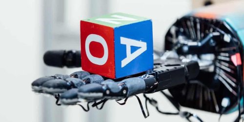 An AI-driven robot hand spent a hundred years teaching itself to rotate a cube - MIT Technology Review