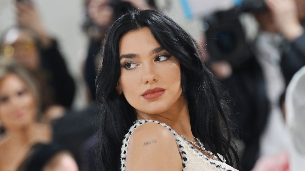 Dua Lipa Wears Vintage 1992 Chanel Corset Gown at the Met Gala 2023 — See Photos