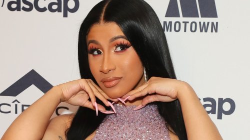 Watch How Cardi B Seamlessly Changes Diapers While Wearing Dagger Nails