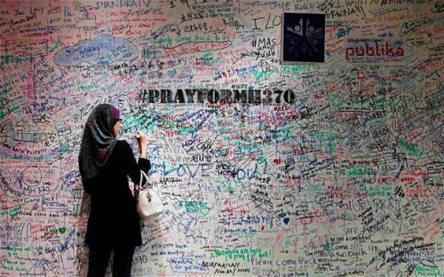 Flight MH370: insurers make first pay out on missing Malaysia Airlines plane