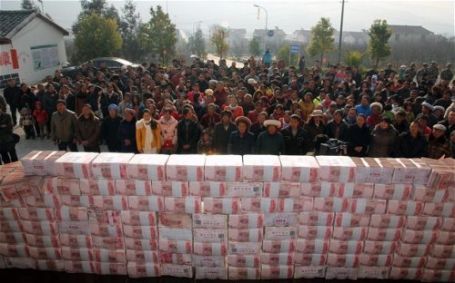 Chinese villagers build £1.3 million 'money wall'