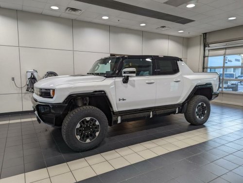 GMC Hummer EV sits lifeless in dealer service garage with no answers in sight