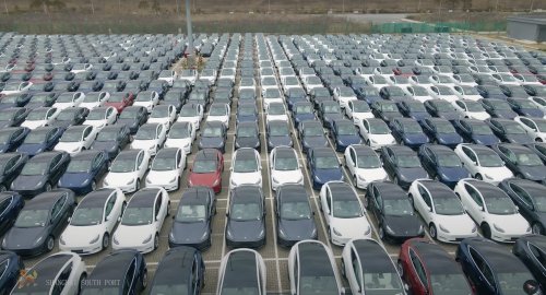 Tesla RHD vehicles spotted waiting for shipment at Shanghai port ...