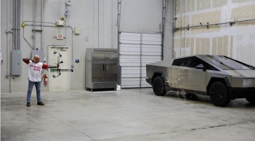 Tesla Cybertruck's 'Bulletproof' Exoskeleton Spotlighted in Latest JRE Podcast with Elon Musk