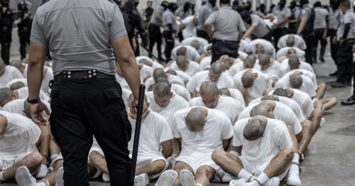 Moment Tren de Aragua gang members arrive at notorious jail after Trump deportation order