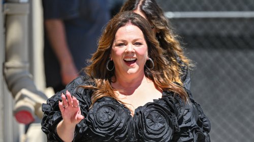 WOW MEL! Melissa McCarthy shows 75-lb weight loss in tight black flower dress as star carries ‘pizza’ bag to film Jimmy Kimmel