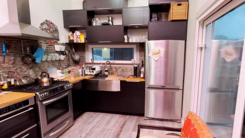 LIVING LARGE I replaced my garage with a ‘tall’ tiny home for $58k – I built it myself and the second floor has extra storage