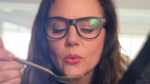 WHAT'S COOKING? 90s star Tiffani Thiessen, now 50, flaunts her curves as she goes shirtless under sweater vest in cooking video