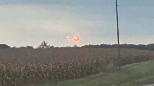 UF-WOAH Terrifying video captures ‘pulsing red UFO’ soaring above family driving home from shopping trip