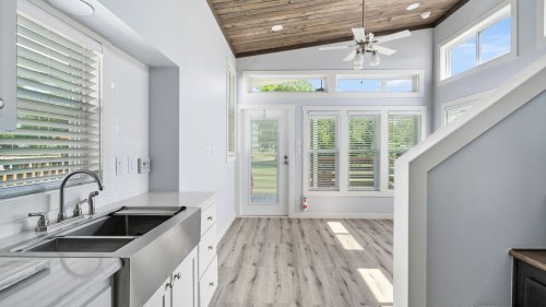 village vibes Inside tiny home village with homes over 400 square feet including bathrooms, bedrooms, full kitchen and pools