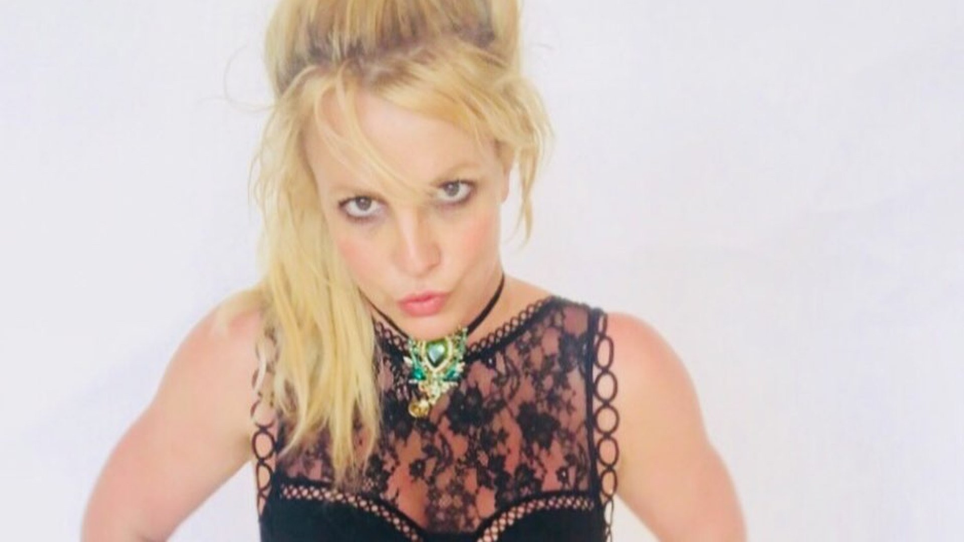 Britney Spears strips down to tights & lace crop top inside $7.4M mansion