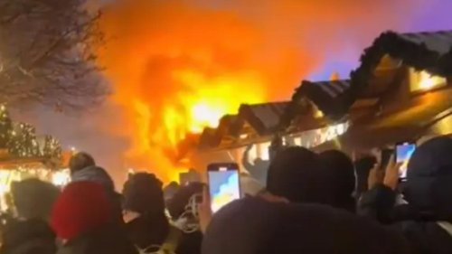 XMAS INFERNO Huge fire rips through world famous Berlin Christmas market as stalls go up in flames and tourists evacuated