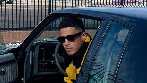 ALL STAR AUTOS Devin Booker’s epic $600k car collection includes stunning Ferrari and classic pink open top Chevy he drove to NBA game