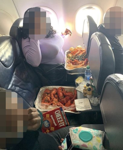 Cabin crew aghast as 'rude' air passenger eats tray of lobster on plane