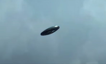 Incredibly clear photo 'shows 50ft disc-shaped UFO emerging from storm ...