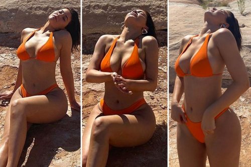 Kylie Jenner busts out of teeny bright orange bikini as she bakes in the hot desert sun during trip to Utah