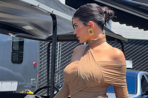 Kylie Jenner shows off her incredible post-baby body in skintight nude dress