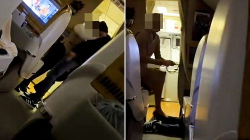 FLYING HEADBUTT Shock moment ‘drunk’ passenger HEADBUTTS air steward in posh business class Emirates flight before crew tie him to seat