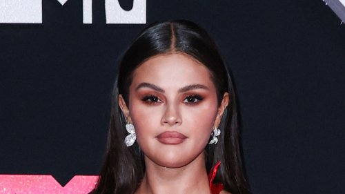 Selena Gomez almost slips out of plunging button-down shirt as she stuns fans in new selfie during Paris trip