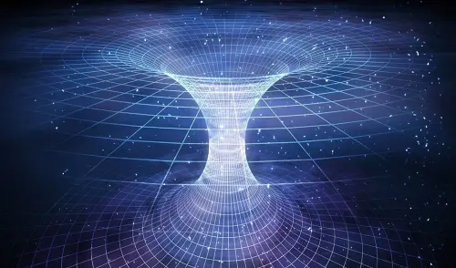 Subatomic wormholes could be responsible for universal expansion