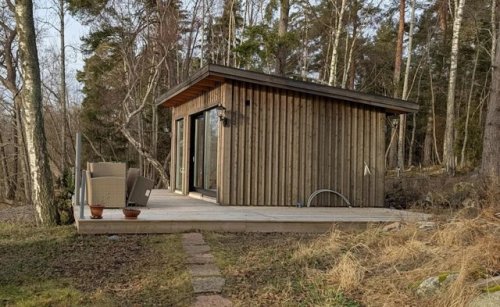 Proud homeowner shares stunning photos of tiny home in the middle of the woods: 'This is all I want in life'