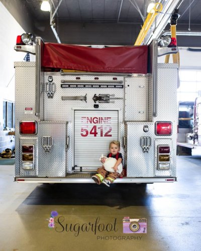 Viral Photo Shoot Features Newborn of Fallen Firefighter and His Firehouse Brothers