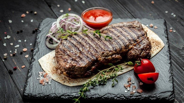 The Reason Dry-Aged Steak Is More Expensive Than Regular Steak