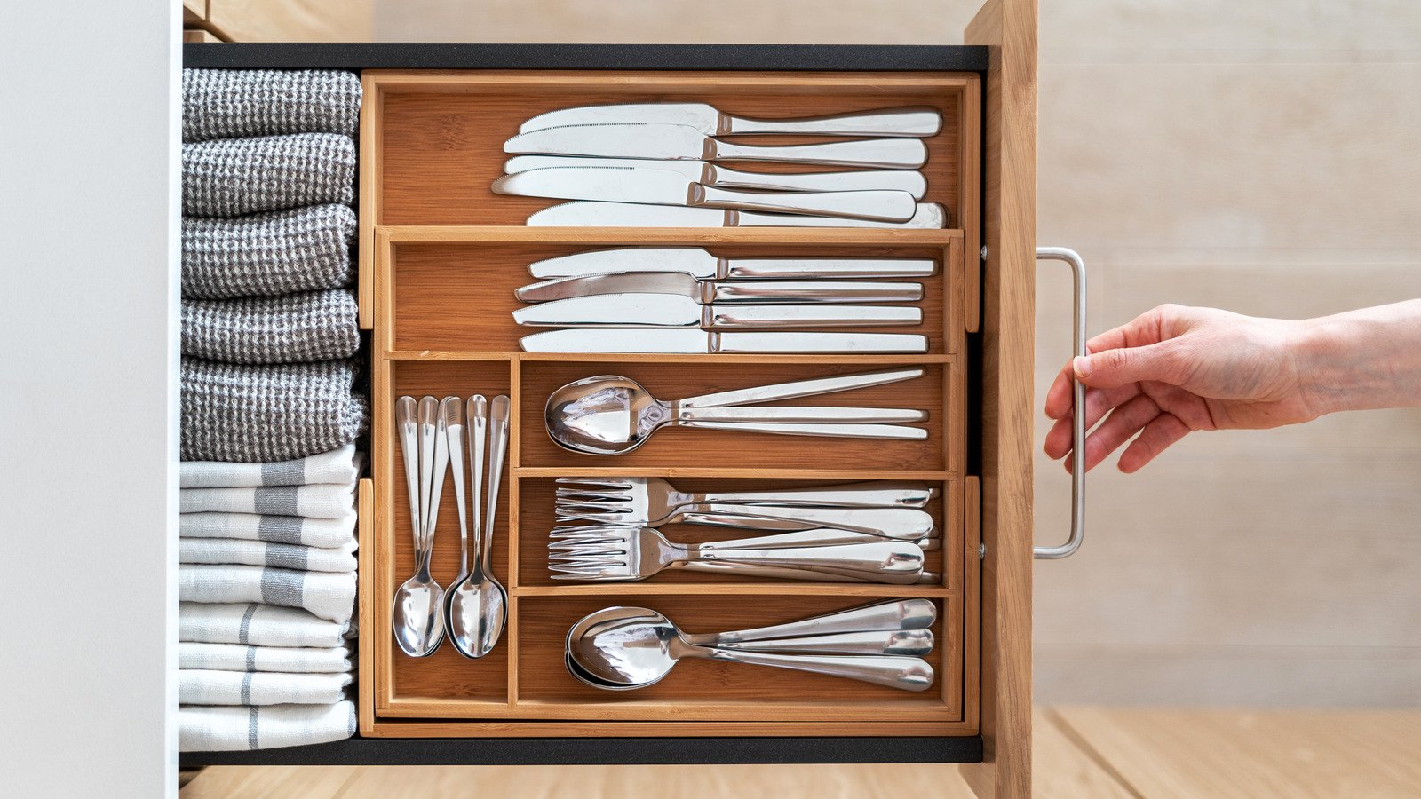 How A Pool Noodle Can Help Organize Your Kitchen Drawers
