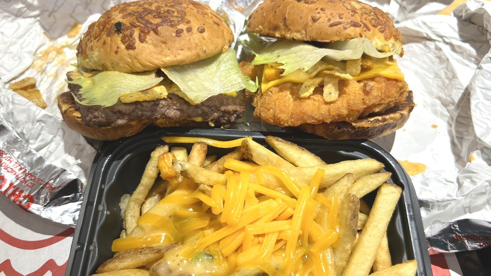 Wendy's Loaded Nacho Cheeseburger, Chicken Sandwich, And Queso Fries Review: A Loaded Mess Of Crunchy Mysteries