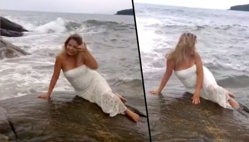 Wife poses on ocean rock for the perfect photo–but watch closely what's coming behind her