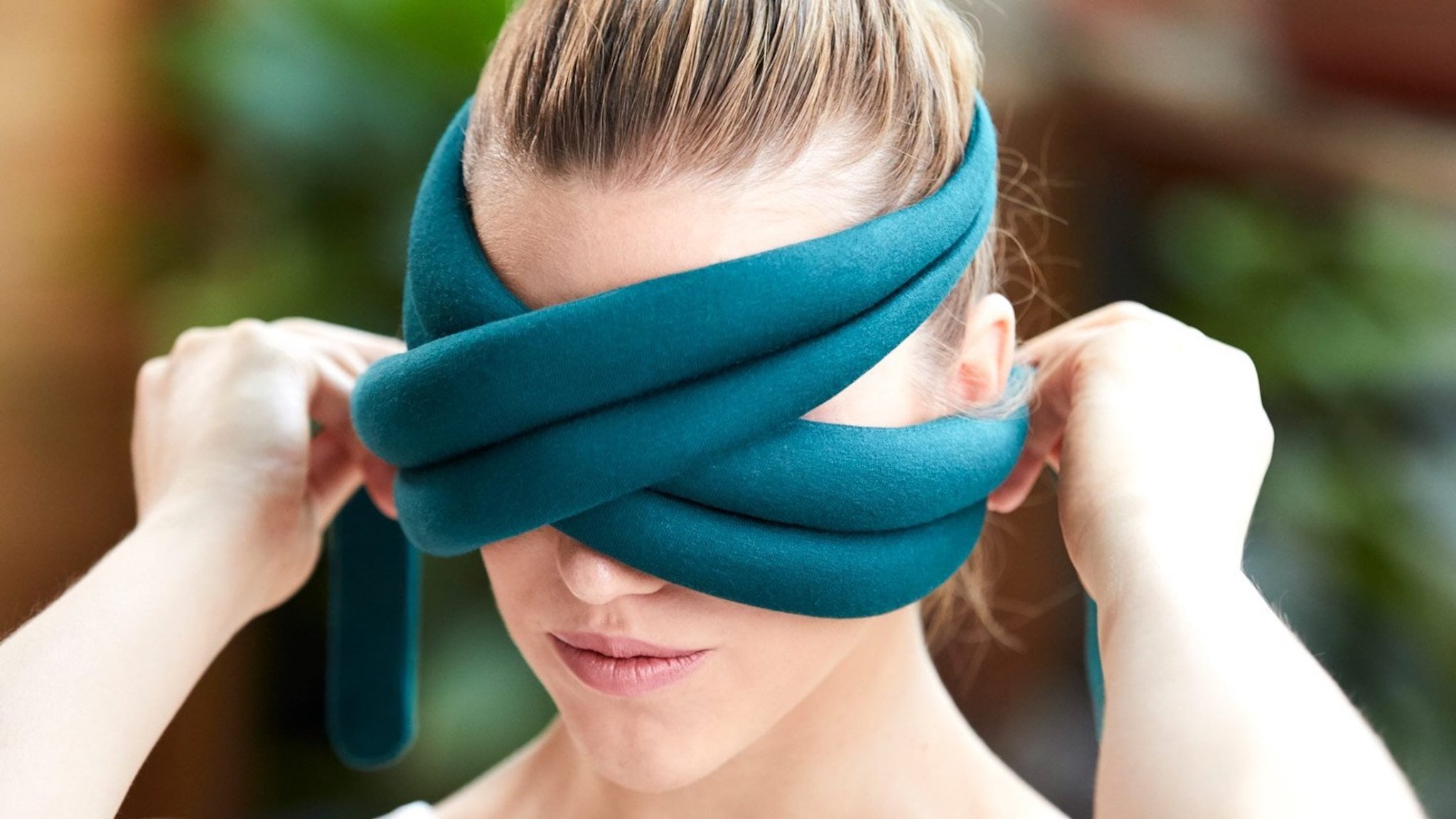 OSTRICHPILLOW LOOP Eye Mask Pillow wraps around your face to black out the world